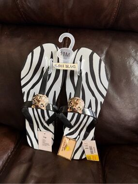 Aloha Island Black & White Zebra Flip Flops with Gold Lion Medallions